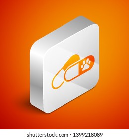 Isometric Dog and pills icon isolated on orange background. Prescription medicine for animal. Silver square button. Vector Illustration