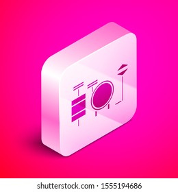 Isometric Drums icon isolated on pink background. Music sign. Musical instrument symbol. Silver square button. Vector Illustration