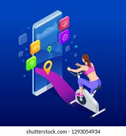 Isometric Fit Woman Training At Home On Exercise Stationary Bike During Workout Holding Phone. Female Health Weekly Habits App