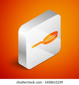 Isometric Frying pan icon isolated on orange background. Fry or roast food symbol. Silver square button. Vector Illustration