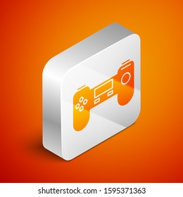 Isometric Gamepad icon isolated on orange background. Game controller. Silver square button. Vector Illustration