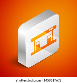 Isometric Gas filling station icon isolated on orange background. Transport related service building Gasoline and oil station. Silver square button. Vector Illustration