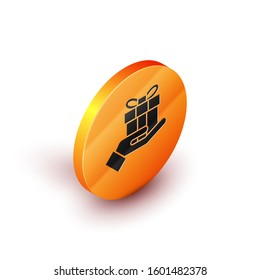 Isometric Gift box in hand icon isolated on white background. Merry Christmas and Happy New Year. Orange circle button. Vector Illustration