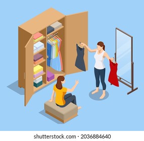 Isometric girl stands near an open wardrobe and chooses clothes. Woman tries on clothes and looks in the mirror