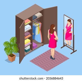 Isometric girl stands near an open wardrobe and chooses clothes. Woman tries on clothes and looks in the mirror