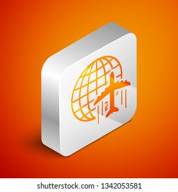 Isometric Globe with flying plane icon isolated on orange background. Airplane fly around the planet earth. Aircraft world icon. Silver square button. Vector Illustration
