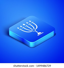 Isometric Hanukkah menorah icon isolated on blue background. Hanukkah traditional symbol. Holiday religion, jewish festival of Lights. Blue square button. Vector Illustration