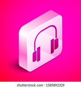 Isometric Headphones icon isolated on pink background. Earphones. Concept for listening to music, service, communication and operator. Silver square button. Vector Illustration