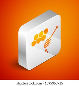 Isometric Honeycomb with honey dipper stickicon isolated on orange background. Honey ladle. Honey cells symbol. Sweet natural food. Silver square button. Vector Illustration