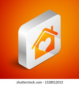 Isometric House with heart shape icon isolated on orange background. Love home symbol. Family, real estate and realty. Silver square button. Vector Illustration