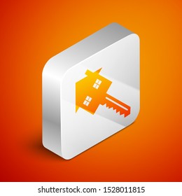 Isometric House with key icon isolated on orange background. The concept of the house turnkey. Silver square button. Vector Illustration