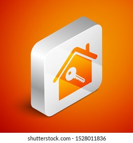 Isometric House with key icon isolated on orange background. The concept of the house turnkey. Silver square button. Vector Illustration