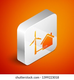 Isometric House with wind turbine for electric energy generation icon isolated on orange background. Eco-friendly house. Environmental Protection. Silver square button. Vector Illustration