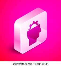 Isometric Human with gear inside icon isolated on pink background. Artificial intelligence. Thinking brain sign. Symbol work of brain. Silver square button. Vector Illustration