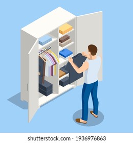 Isometric large wardrobe with things. Man choosing outfit from large wardrobe closet with clothes and home stuff