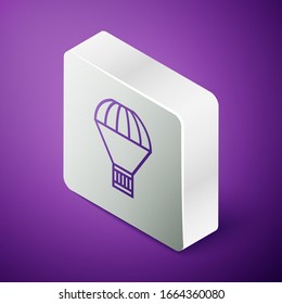Isometric line Box flying on parachute icon isolated on purple background. Parcel with parachute for shipping. Delivery service, air shipping. Silver square button. Vector Illustration