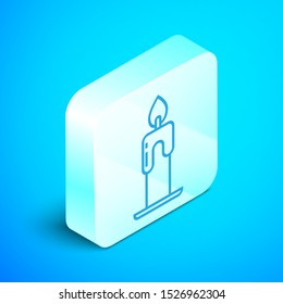 Isometric line Burning candle icon isolated on blue background. Cylindrical aromatic candle stick with burning flame. Happy Halloween party. Silver square button. Vector Illustration