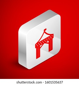 Isometric line Camping tent icon isolated on red background. Carnival camping tent. Amusement park. Silver square button. Vector Illustration