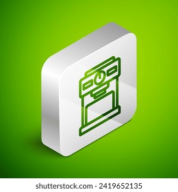 Isometric line Coffee machine icon isolated on green background. Silver square button. Vector