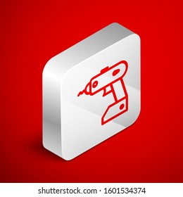 Isometric line Electric cordless screwdriver icon isolated on red background. Electric drill machine. Repair tool. Silver square button. Vector Illustration