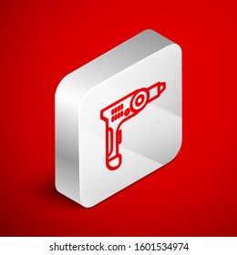 Isometric line Electric drill machine icon isolated on red background. Repair tool. Silver square button. Vector Illustration
