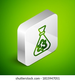 Isometric line Garbage bag with recycle symbol icon isolated on green background. Trash can icon. Recycle basket sign. Silver square button. Vector.