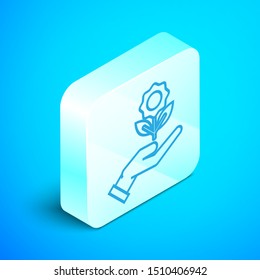 Isometric line Hand holding flower icon isolated on blue background. Seed and seedling. Planting sapling. Ecology concept. Silver square button. Vector Illustration