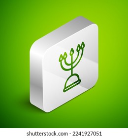 Isometric line Hanukkah menorah icon isolated on green background. Hanukkah traditional symbol. Holiday religion, jewish festival of Lights. Silver square button. Vector Illustration