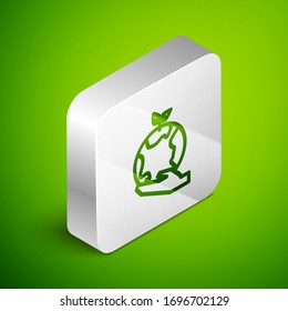 Isometric line Human hands holding Earth globe icon isolated on green background. Save earth concept. Silver square button. Vector Illustration