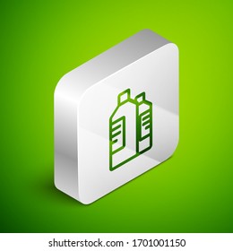 Isometric line Plastic bottles for laundry detergent, bleach, dishwashing liquid or another cleaning agent icon isolated on green background. Silver square button. Vector Illustration