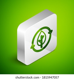 Isometric line Recycle symbol and leaf icon isolated on green background. Environment recyclable go green. Silver square button. Vector.