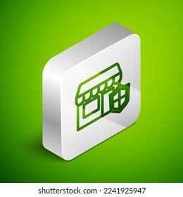 Línea isométrica Edificio de compras con icono de escudo aislado en fondo verde. Concepto de seguro. Seguridad, seguridad, protección, concepto de protección. Botón cuadrado plateado. Vector