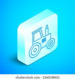 Isometric line Tractor icon isolated on blue background. Silver square button. Vector Illustration