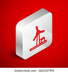 Isometric line Wind turbine icon isolated on red background. Wind generator sign. Windmill for electric power production. Silver square button. Vector Illustration