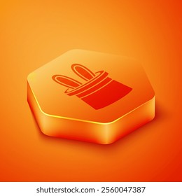 Isometric Magician hat and rabbit ears icon isolated on orange background. Magic trick. Mystery entertainment concept. Orange hexagon button. Vector