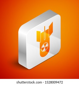 Isometric Nuclear bomb icon isolated on orange background. Rocket bomb flies down. Silver square button. Vector Illustration