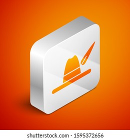 Isometric Oktoberfest hat icon isolated on orange background. Hunter hat with feather. German hat. Silver square button. Vector Illustration