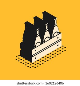 Isometric Pack of beer bottles icon isolated on yellow background. Wooden box and beer bottles. Case crate beer box sign.  Vector Illustration