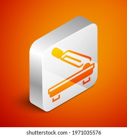 Isometric Paper cutter icon isolated on orange background. Silver square button. Vector