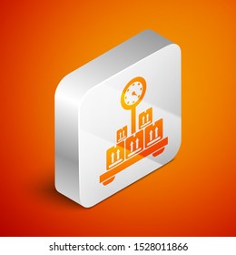 Isometric Scale with cardboard box icon isolated on orange background. Logistic and delivery. Weight of delivery package on a scale. Silver square button. Vector Illustration