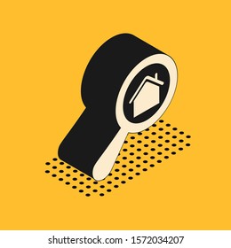 Isometric Search house icon isolated on yellow background. Real estate symbol of a house under magnifying glass.  Vector Illustration