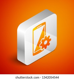 Isometric Setting on smartphone screen icon on orange background. Mobile phone and gear sign. Adjusting app, set options, repair, fixing phone concepts. Silver square button. Vector Illustration