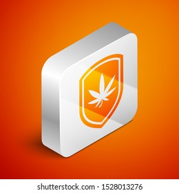 Isometric Shield and marijuana or cannabis leaf icon isolated on orange background. Marijuana legalization. Hemp symbol. Silver square button. Vector Illustration
