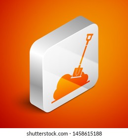 Isometric Shovel in the ground icon isolated on orange background. Gardening tool. Tool for horticulture, agriculture, farming. Silver square button. Vector Illustration
