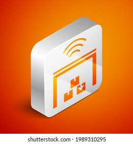 Isometric Smart warehouse system icon isolated on orange background. Silver square button. Vector