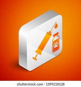 Isometric Syringe with pet vaccine icon isolated on orange background. Dog or cat paw print. Silver square button. Vector Illustration