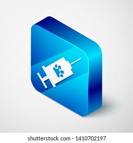 Isometric Syringe with pet vaccine icon isolated on white background. Dog or cat paw print. Blue square button. Vector Illustration
