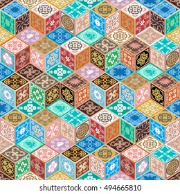 Isometric tiled background. Abstract seamless vector pattern. Composition made from 3d ceramic cubes with floral and geometric ornaments. Italian, Spanish, Moroccan, Tunisian motifs. 