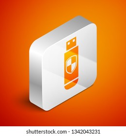 Isometric USB flash drive and protection shield icon isolated on orange background. Silver square button. Vector Illustration
