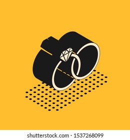 Isometric Wedding rings icon isolated on yellow background. Bride and groom jewelery sign. Marriage icon. Diamond ring.  Vector Illustration